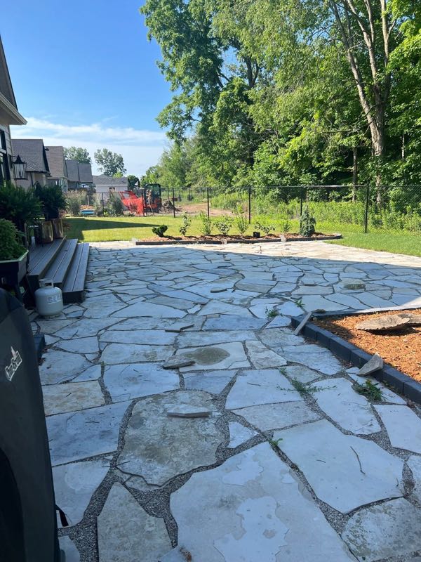 Natural flagstone patio in a backyard